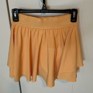 Orange Lululemon tennis skort